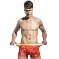 Herren-Boxershorts in kräftigem Rot mit gelben abstrakten Prints und elastischem Bund - M / Rot