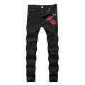 Detail of red rose embroidery and distressed ripped holes on men's black slim denim jeans - EU 38 / Black Front Embroidery