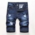 Gedetailleerd beeld van donkerblauwe denim shorts met handgemaakte gaten en whiskers effecten - EU 28 / Donkerblauw