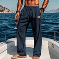 Men's navy linen drawstring trousers with elastic waist and pocket detail outdoors - S / Navy Blue