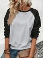 Detailed view of women's raglan sleeve sweatshirt showing ribbed cuffs and contrast fabric - S / Black Sleeve + Light Grey