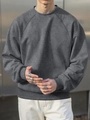 Detail of raglan sleeve and melange grey fabric on a men's crewneck sweatshirt - S / Dark Gray