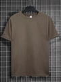 Detailaufnahme der braunen Waffelstrick-Struktur und des Innenetiketts am T-Shirt - S / Dunkelbraun