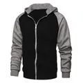 Détail des manches raglan, poignets côtelés et fermeture éclair sur sweat à capuche - S / Noir