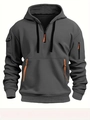 Detailansicht des Tactical Hoodies mit Armreißverschlusstasche und orangenen Zierelementen - S / Dunkelgrau