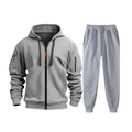 Detail of grey men's tracksuit showing zipper hoodie with orange accents and ribbed cuffs - S / Light Gray