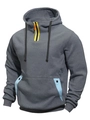 Detail van grijze herenhoodie met gele ritssluiting en blauwe accenten op de kangoeroezak - M / donkergrijs