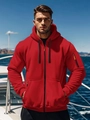Detail of red men's zip-up hoodie featuring a black drawstring and utility arm pocket - S / Red