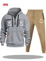 Detail of hoodie set featuring multiple orange zipper pockets and smile print designs - S / Light Gray & Khaki
