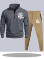 Detail of grey half-zip sweatshirt and khaki joggers with football theme festive print - S / Top And Bottom / Dark Grey And Khaki