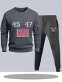 Detail of dark grey tracksuit showing American flag print and drawstring jogger texture - S / Top And Bottom / Dark Gray