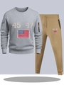 Detail of grey sweatshirt and khaki joggers featuring zip pockets and number embroidery - S / Top And Bottom / Light Gray & Khaki