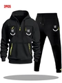 Black streetwear tracksuit with hoodie and pants featuring green zippers and smile logo - S / Black