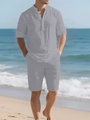 Detail der hellgrauen Leinentextur am Herren-Langarmhemd und den Urlaubs-Shorts - S / Grau