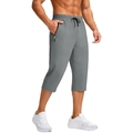 Detail view of men's quick-dry sports joggers featuring gray fabric and a zip pocket - M / Dark Gray