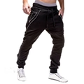 Detail view of men's black joggers featuring decorative double diagonal metal zippers - M / Bottoms / Black