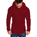 Detail view of the ribbed shoulder texture and slim fit design on a dark red hoodie - M / Burgundy