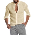 Detail of men's linen shirt showing beige fabric texture, mandarin collar and white buttons - Khaki