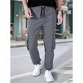 Pantaloni cargo jogger grigio scuro da uomo con tasche laterali e coulisse regolabile - grigio scuro