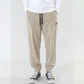 Detail of khaki corduroy texture with side cargo pocket and brown leather logo patch - S / Khaki
