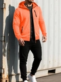 Detail of men's orange hooded jacket and black jogger pants for sports and outdoor training - Orange