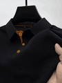 Men's mesh ice silk polo shirt in black with orange button accents and waffle texture - S / Tops / Black