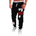 Men's black hip-hop sweatpants featuring bold New York letter prints and elastic drawstring waist - M / Black Red