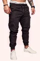 Detail view of brown cargo jogger pants with drawstring waist and side flap pockets - Iron Grey