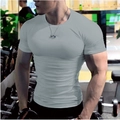 T-shirt de sport gris moulant pour hommes pour la musculation en salle de fitness - M / Gris clair