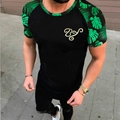 Herren Sport T-Shirt in Schwarz mit tropischem Palmenblatt-Print an den Ärmeln und Logo - Schwarz & Grün