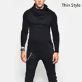 Dünnes schwarzes Herren-Langarmshirt mit modischem Rollkragen und unregelmäßigem Saum - M / Schwarz