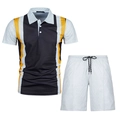 Detail of men's polo set featuring 3D geometric patterns and orange contrast panels - XS / Top And Bottom (ZT187-ZK87-21) / Black White Yellow Maze Contrast