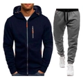 Dettaglio della felpa blu con zip arancione e pantaloni sportivi grigi con polsini - Blu Navy e Grigio Scuro