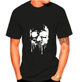 Close-up of the white dripping skull graphic on a black short sleeve cotton t-shirt - M / Black