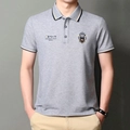 Men's grey business casual polo shirt with embroidered chest logo and striped collar - Light Gray