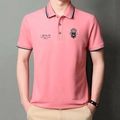 Men's light pink polo shirt with embroidered badge and navy blue striped collar - M / Watermelon red