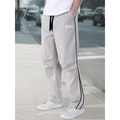 Light gray loose fit sports trousers with black side stripes and drawstring waist - S / Off-White