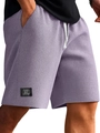 Dettaglio del tessuto a nido d'ape viola su pantaloncini sportivi uomo con coulisse - Taglia M / Viola