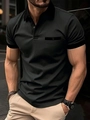 Detailansicht der Tasche und des geknöpften Brustdesigns des schwarzen Poloshirts - S / Schwarz