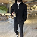 Close-up of black corduroy tracksuit showing half-zip stand collar and ribbed fabric texture - S / Top And Bottom / Black