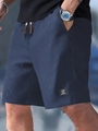 Men's waffle knit drawstring shorts in navy blue, casual relaxed fit for summer wear - S / Navy Blue