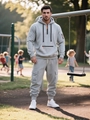 Men's grey hooded fleece tracksuit set with contrast orange zippers and cargo pockets - Light Gray