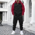 Detail of hooded patchwork jacket and cargo pants with multiple pockets on a male model - S / Black
