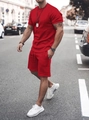 Close-up of men's red summer casual set featuring a round neck t-shirt and drawstring shorts - S / Red