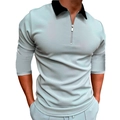 Detail eines mintgrünen Polo-Shirts mit schwarzem Kontrastkragen und Metall-Reißverschluss - S / Hellgrau