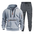 Dettaglio felpa con cappuccio azzurra con accenti arancioni e pantaloni sportivi grigi - Taglia M / Grigio chiaro/Grigio scuro