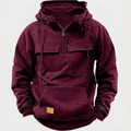 Detail of burgundy half-zip hoodie featuring front chest pockets and kangaroo pouch design - S / Burgundy