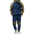 Dettaglio del set coordinato uomo con giacca con cappuccio bicolore e pantaloni - M / Patchwork Blu Reale (Verde)