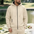 Detail of men's beige fleece hoodie featuring black zipper contrast and drawstring hood - S / Set / Apricot