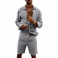 Detailed macro view of gray linen fabric texture on men's beach shirt and drawstring shorts - Gray
